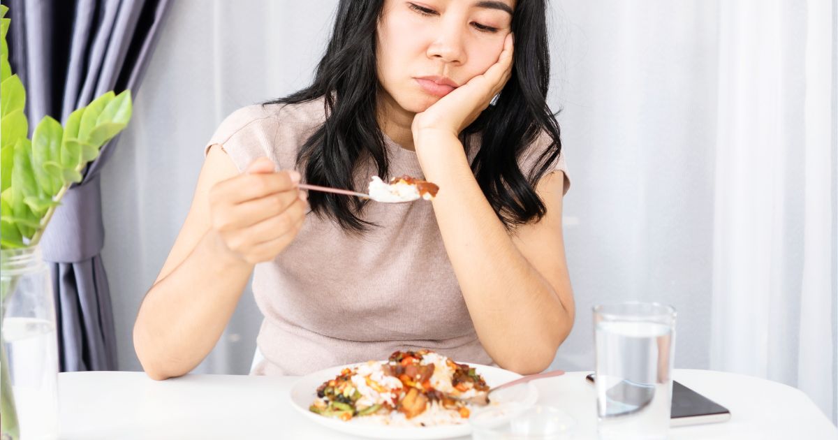 Asian lady with a lack of appetite